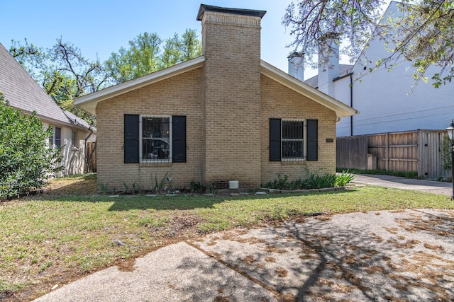 4077 Amherst Ave, University Park, TX 75225 - view of side of home featuring brick siding and a chimney