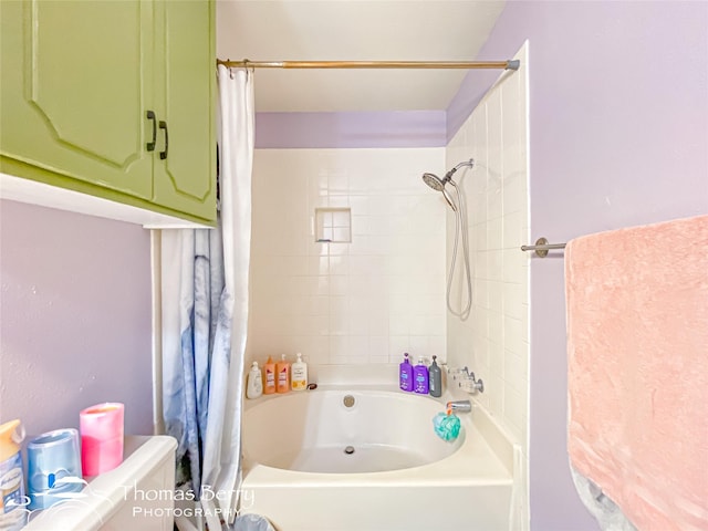 bathroom featuring shower / bathtub combination with curtain