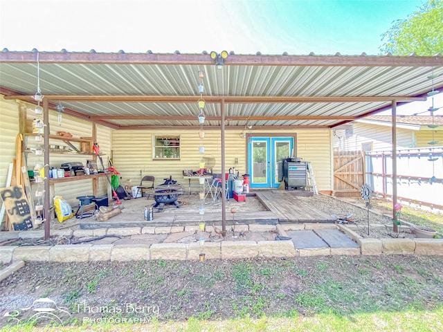 view of patio / terrace featuring fence and an outdoor fire pit