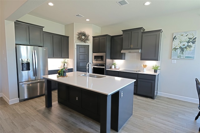 645 Summer Grove Dr, Midlothian, TX 76065 - kitchen featuring appliances with stainless steel finishes, a sink, a kitchen island with sink, baseboards, and recessed lighting