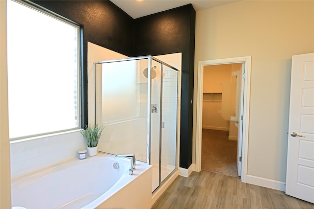 645 Summer Grove Dr, Midlothian, TX 76065 - full bath featuring a shower stall, a garden tub, wood finished floors, and a spacious closet