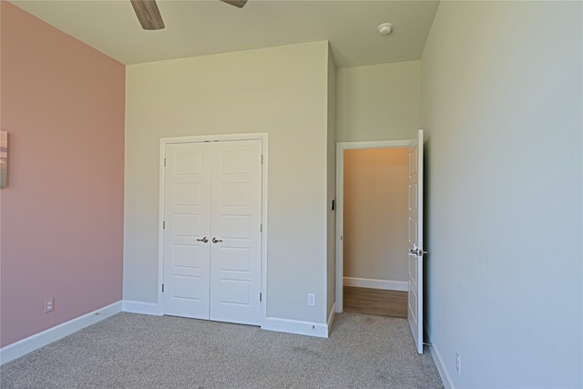 645 Summer Grove Dr, Midlothian, TX 76065 - unfurnished bedroom with carpet flooring, baseboards, a ceiling fan, and a closet