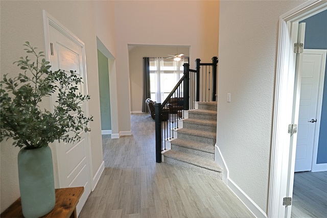 645 Summer Grove Dr, Midlothian, TX 76065 - entrance foyer featuring light wood-style floors, stairs, baseboards, a ceiling fan, and a textured wall