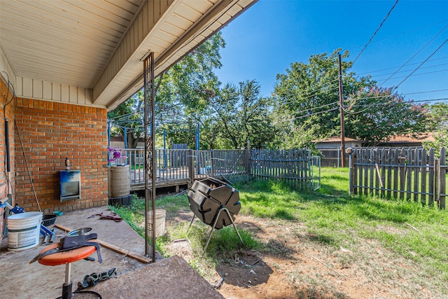 1206 John Reagan St, Benbrook, TX 76126 - view of yard featuring a wooden deck