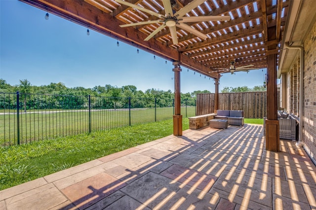 view of patio / terrace with a ceiling fan, a pergola, and a fenced backyard