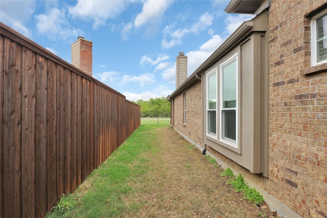 view of yard with fence
