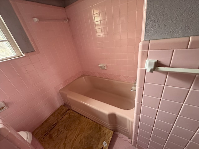 1905 Province Ln, Dallas, TX 75228 - full bath featuring tile walls, shower / bathing tub combination, and tile patterned flooring