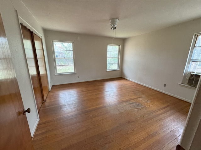 1905 Province Ln, Dallas, TX 75228 - spare room featuring baseboards and wood finished floors