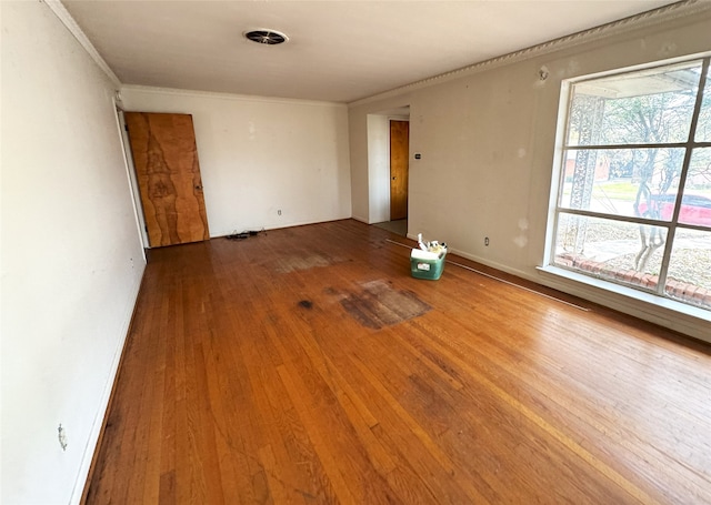 1905 Province Ln, Dallas, TX 75228 - spare room featuring ornamental molding and wood finished floors
