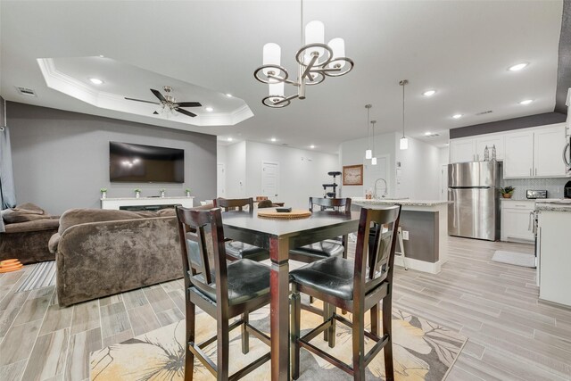 dining room with crown molding, a ceiling fan, recessed lighting, and wood tiled floor