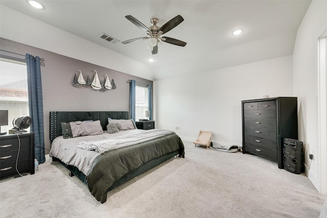 bedroom featuring light colored carpet, ceiling fan, visible vents, and recessed lighting