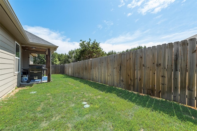 view of yard featuring a fenced backyard