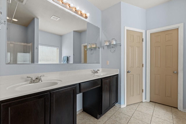 6517 Sierra Madre Dr, Fort Worth, TX 76179 - bathroom with double vanity, tile patterned floors, visible vents, and a sink