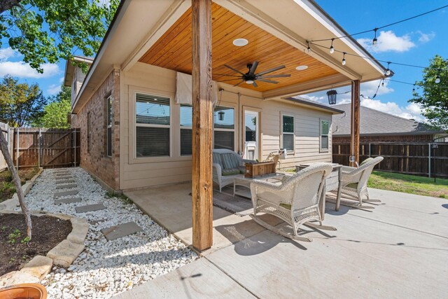 6517 Sierra Madre Dr, Fort Worth, TX 76179 - view of patio featuring a gate, ceiling fan, outdoor dining area, and a fenced backyard
