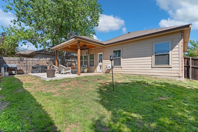 6517 Sierra Madre Dr, Fort Worth, TX 76179 - back of house with a fenced backyard, a patio, ceiling fan, and a yard