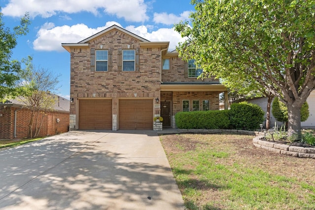 6517 Sierra Madre Dr, Fort Worth, TX 76179 - view of front of home with brick siding, a garage, and concrete driveway