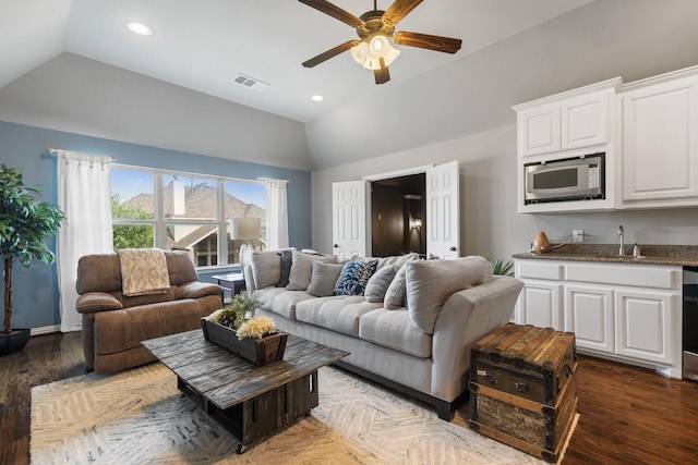 901 Moss Glen Dr, Prosper, TX 75078 - living area featuring vaulted ceiling, visible vents, recessed lighting, and a ceiling fan