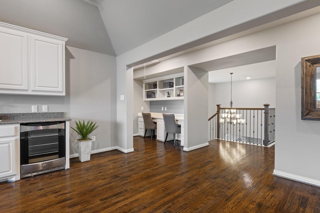 901 Moss Glen Dr, Prosper, TX 75078 - interior space with baseboards, beverage cooler, white cabinetry, and dark wood-style flooring