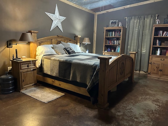 bedroom featuring finished concrete flooring