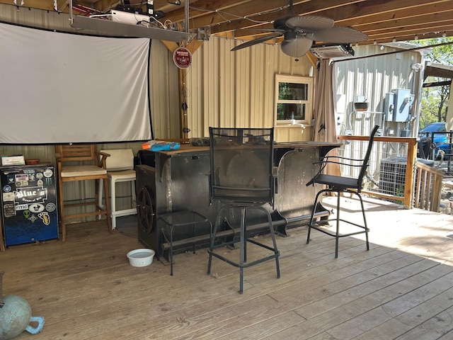 exterior space featuring hardwood / wood-style floors and ceiling fan
