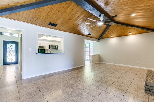 unfurnished living room featuring visible vents, a brick fireplace, wooden ceiling, and light tile patterned floors