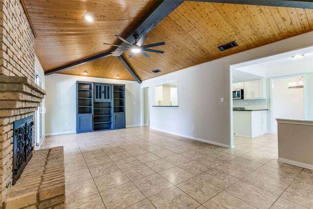 unfurnished room featuring baseboards, a ceiling fan, visible vents, and dark wood-style flooring