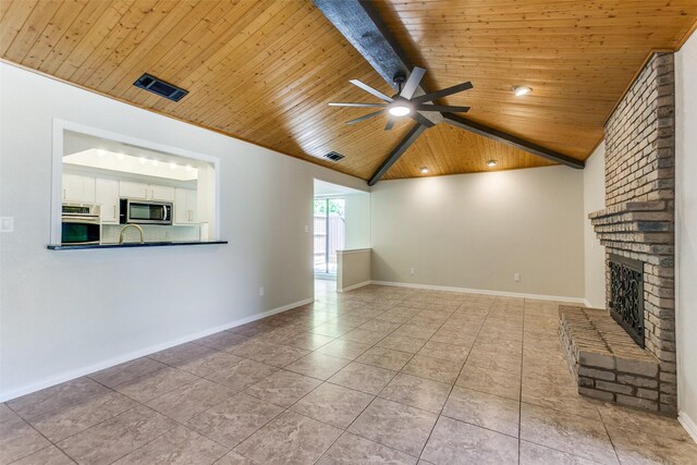 unfurnished bedroom featuring wood finished floors, visible vents, baseboards, and ceiling fan