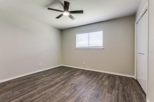 empty room featuring light colored carpet, an AC wall unit, visible vents, and ceiling fan