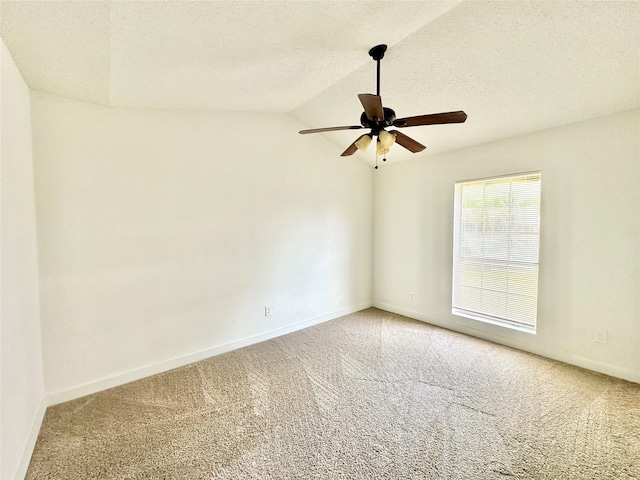 10035 Everton Pl, Dallas, TX 75217 - spare room featuring baseboards, a ceiling fan, carpet, and lofted ceiling