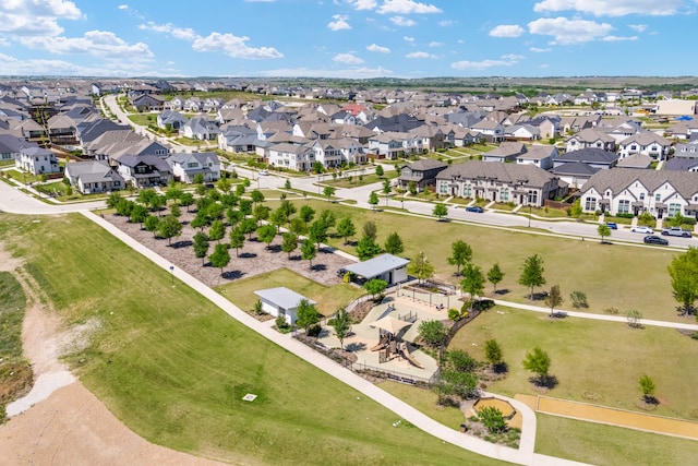 birds eye view of property with a residential view