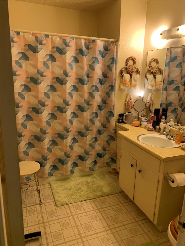 824 Opal St, Saginaw, TX 76179 - full bathroom featuring tile patterned floors, vanity, and a shower with curtain