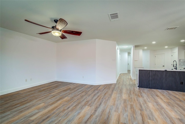 2023 Lake Trail Dr, Heartland, TX 75126 - unfurnished room featuring light wood-style floors, a ceiling fan, visible vents, and recessed lighting