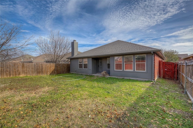 2023 Lake Trail Dr, Heartland, TX 75126 - rear view of property with a yard, a fenced backyard, roof with shingles, and a chimney