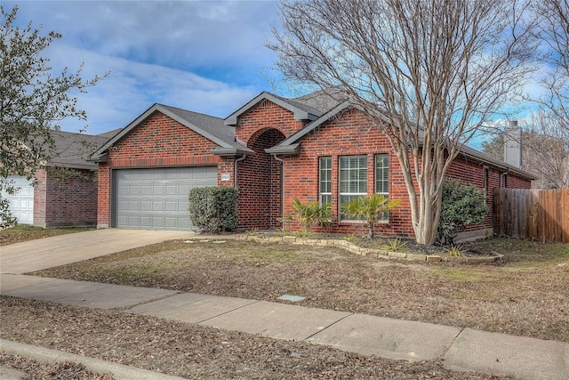 2023 Lake Trail Dr, Heartland, TX 75126 - view of front of house featuring brick siding, fence, a garage, and concrete driveway