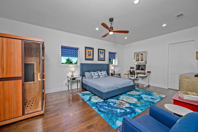 bedroom featuring ceiling fan, visible vents, baseboards, dark wood-style floors, and recessed lighting