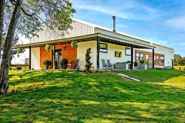 back of house with a yard