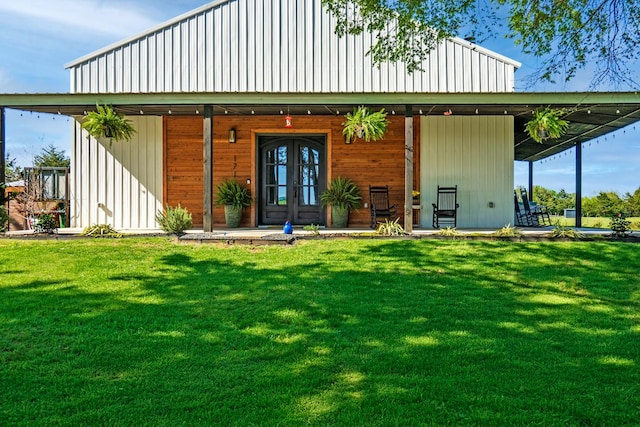 back of house with a yard