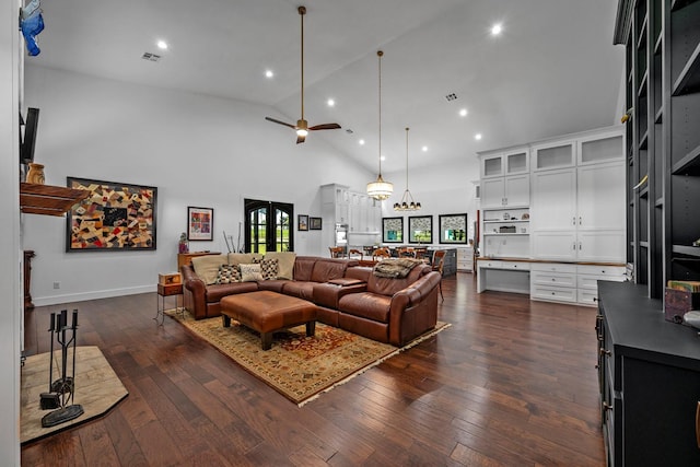 living area featuring a ceiling fan, dark wood-style flooring, visible vents, high vaulted ceiling, and recessed lighting