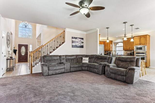 4745 Eagle Trace Dr, Fort Worth, TX 76244 - living room with light tile patterned flooring, light colored carpet, ceiling fan, and stairway