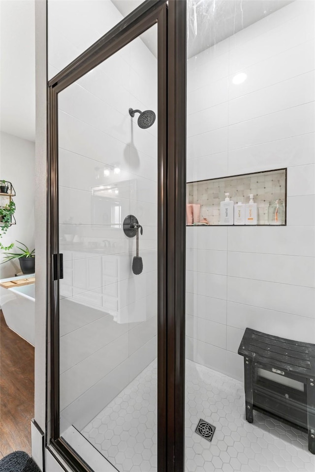 7423 Morning Glory Rd, Abilene, TX 79602 - full bath featuring a shower stall and wood finished floors