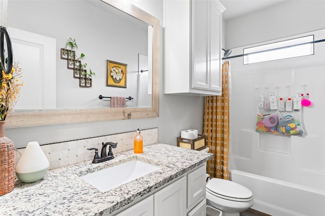 7423 Morning Glory Rd, Abilene, TX 79602 - bathroom featuring toilet, vanity, shower / tub combo, and decorative backsplash