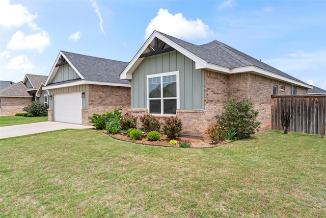 7423 Morning Glory Rd, Abilene, TX 79602 - view of front facade with brick siding, board and batten siding, concrete driveway, a garage, and roof with shingles