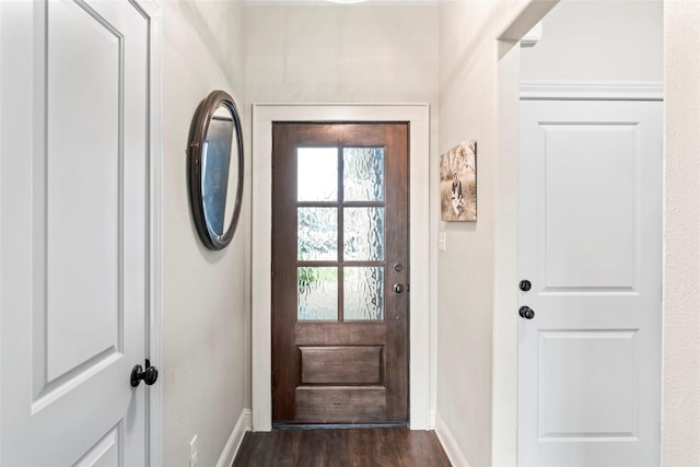 7423 Morning Glory Rd, Abilene, TX 79602 - doorway to outside with baseboards and dark wood finished floors