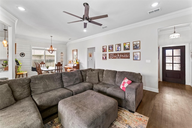 7423 Morning Glory Rd, Abilene, TX 79602 - living room with wood finished floors, baseboards, a ceiling fan, a chandelier, and ornamental molding
