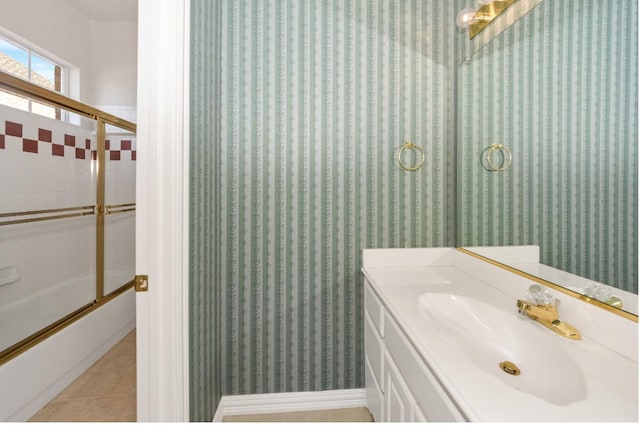 824 Parkwood Ct, Mckinney, TX 75072 - bathroom with vanity, bath / shower combo with glass door, and tile patterned floors
