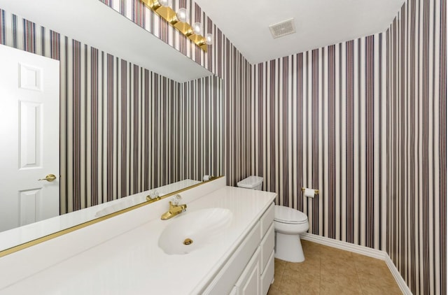 824 Parkwood Ct, Mckinney, TX 75072 - bathroom with toilet, wallpapered walls, vanity, baseboards, and tile patterned flooring