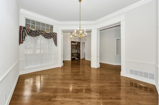 824 Parkwood Ct, Mckinney, TX 75072 - unfurnished dining area with a chandelier, wood finished floors, crown molding, and baseboards