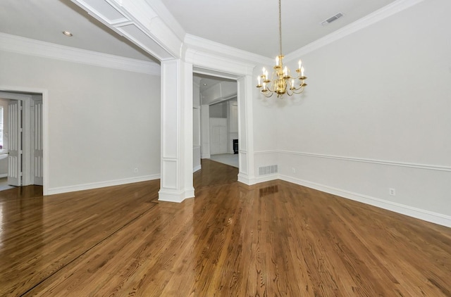 824 Parkwood Ct, Mckinney, TX 75072 - unfurnished dining area featuring a chandelier, wood finished floors, crown molding, baseboards, and a fireplace