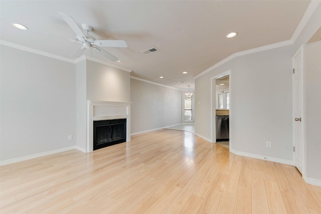 unfurnished living room featuring ceiling fan, a fireplace, recessed lighting, ornamental molding, and light wood-style flooring