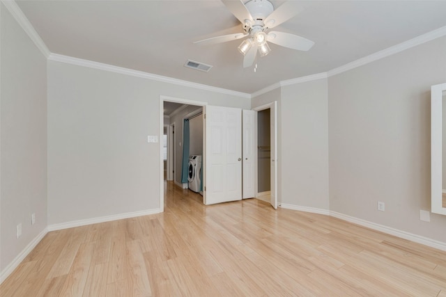 spare room with light wood-style floors, ornamental molding, ceiling fan, and baseboards